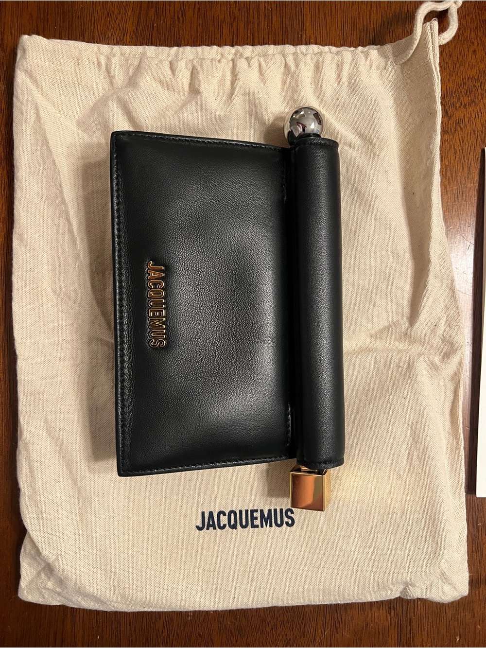 Jacquemus Small Rond Carré Clutch in Black with Gold Accent 2025